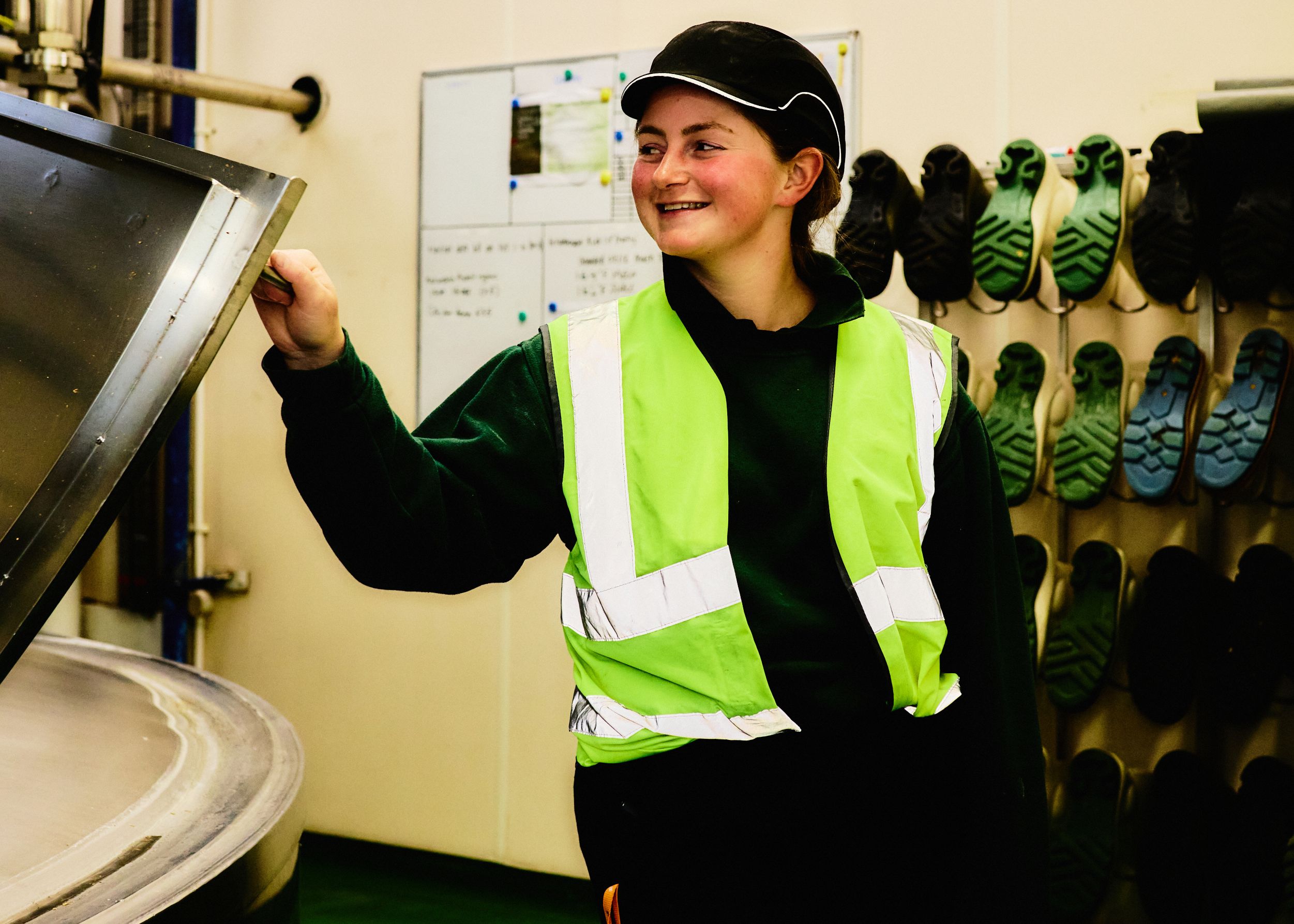 Timothy Taylor's Brewery Team Leader smiling in brewery