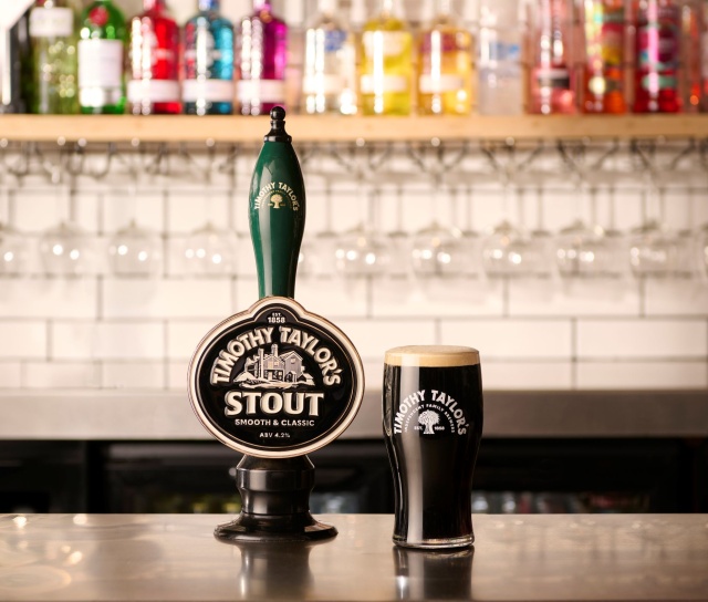Pint of Timothy Taylor’s Stout with a creamy white head.