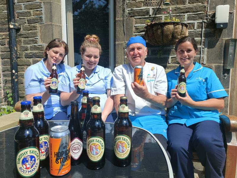 Staff at Manorlands enjoying donated beers as part of Beer Day Britain.